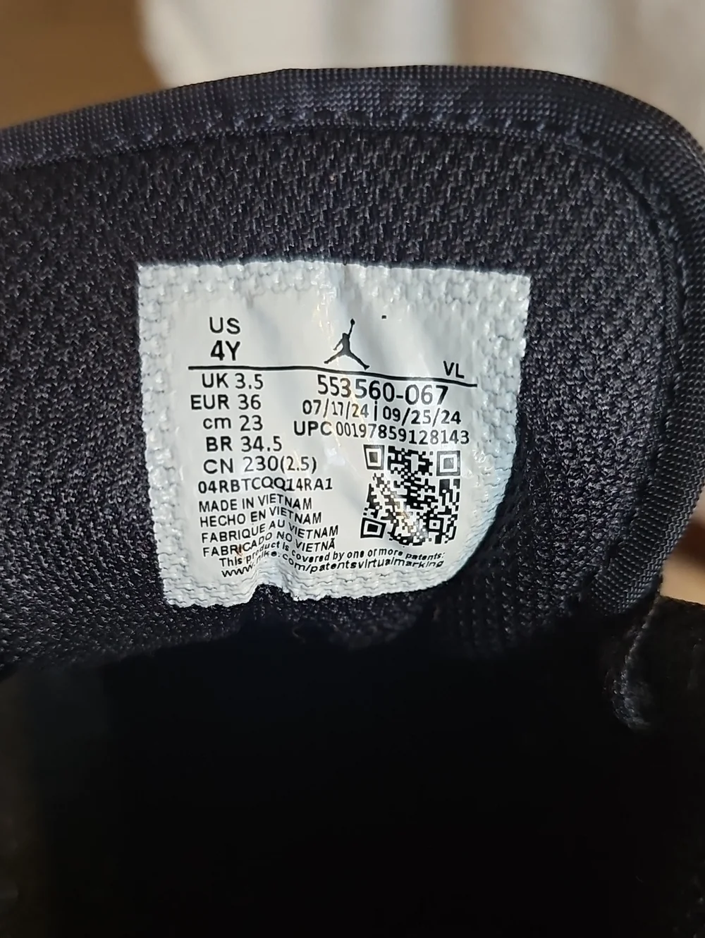 Jordan Youth Black And Red Sneaker with Jumpman Label